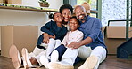 Family, boxes and smile for new home on floor with relocation to property investment or real estate. Black people, parents and children with happiness, package or moving house together on ground