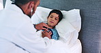 Doctor, boy kid and stethoscope in bed at hospital in consultation for healthcare, assessment and check breathing. Medic, pediatrician and child for lungs, cardiology and questions in home bedroom