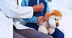 Doctor, hands and stethoscope for child in hospital with lion toys for health, assessment and check for breathing. Medic, pediatrician and helping for lungs, cardiology and wellness on bed in clinic