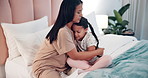 Mother, child and hug with thermometer on bed for fever, temperature or monitoring illness together at home. Mom hugging little girl with virus, flu or cold for care, love or support in bedroom