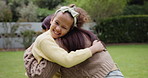 Family, hug and a girl running to her mother in the garden of their home for summer bonding together. Energy, smile or happy with a young woman parent embracing her excited daughter in the backyard