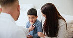Medical, stethoscope of a doctor with a mother and son in their home for an appointment or checkup. Family, healthcare and trust with a pediatrician in an apartment for consulting or treatment