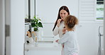 Hygiene oral care and a family brushing teeth in the bathroom of their home together for morning routine. Toothbrush, toothpaste or dental with a mother and daughter cleaning in their apartment