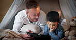 Tablet, child and father talk with bedroom fort for social media, video or online gaming at home. Website, dad and boy together with bonding, streaming and movie with duvet and internet in a house