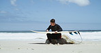 Waxing a surfboard provides the surfer with grip and traction