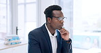 Businessman, face and thinking in planning, decision or choice for idea or brainstorming at office. Black man, African male person or employee in wonder. thought or project plan for task at workplace