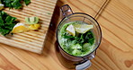 Smoothie, blender and green juice with nutritionist, gut health and weight loss drink from above. Kitchen, vegetables and wellness with diet, spinach and protein shake with kale and kiwi fruit 