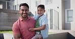 Family, child and father outdoor by new house for real estate, property investment and mortgage in neighborhood. Face or portrait of happy single parents, Asian dad and boy or kid in backyard of home