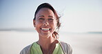 Beach, holiday and face of mature woman on vacation to relax in summer with nature. Happy, person and portrait with smile from health, wellness and laugh in Brazil sunshine, outdoor and blue sky