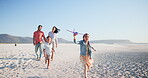 Family, parents and kids on beach with plane for playing, relax and bonding on holiday or vacation. Travel, man and woman with children by ocean or sea for summer, adventure or experience with happy