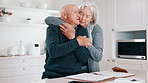 Senior couple, hug and kitchen with paperwork in a home with retirement and marriage with love. Support, care and bonding with a elderly man with notes and wife together with discussion in a house