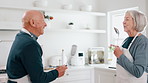 Cooking, dance and senior couple singing in a kitchen with fun, energy and bonding in their home. Love, karaoke and old people with utensils in a house for retirement, celebration or radio music 