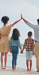 Family insurance, parents and children on beach for vacation, summer holiday and travel security with love. Back of people, mother and father with kids for cover, hands together high five for unity