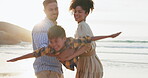 Happy family, holding child and airplane on beach, smile and nature to relax for calm holiday. Father, mother and son with bonding with play game, love and travel vacation by coast for peace wellness