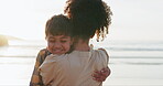 Son, smile and mother to hug on beach, health and nature to relax for calm summer holiday. Happy family, woman or child with bonding together, love care or travel vacation by coast for peace wellness