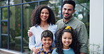 Happy, face and parents with children by new home for property investment in garden together. Smile, portrait and young mother and father standing with kids by modern house, building or apartment.