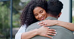 Happy couple, hug and love by new home in care, romance or outdoor embrace for real estate together. Woman hugging man in trust for marriage, affection or compassion in property investment outside