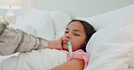 Girl, sick and mother with thermometer, virus and check for fever in bedroom with temperature . Family, mama and kid with disease, bacteria or care with wellness, first aid and child with flu or home