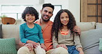 Love, smile and face of father and children on a sofa for bonding and relaxing together at home. Happy, care and portrait of young Indian dad with kids sitting in the living room of modern house.