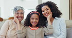 Happy, face and child with mother and grandmother on sofa in the living room of family house. Smile, love and portrait of girl kid relaxing and touching her mom and senior woman in retirement at home