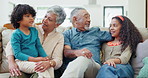 Love, big family and children with grandparents on a sofa with support, trust and conversation in their home. Speaking, care and kids with old people in a living room for discussion or weekend visit