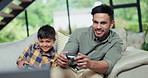 Father, child and play video game in home living room, competition and happy together. Tv tech, dad and kid on controller console, esports entertainment and family bonding, smile and contest on sofa