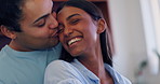 Couple, embrace and kiss on cheek with love or care in marriage, partnership or home. Happy, man and woman hug with kindness, support or trust in interracial relationship together in kitchen or house