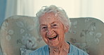 Home, funny and elderly woman on a couch, smile and happy with memory, ideas and nostalgia. Pensioner, apartment and senior person with joy, humor and laughing with a break, retirement or cheerful