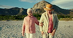 Senior women, friends and walk at beach with talk, love and vacation with care, summer and freedom. People, retirement and conversation in nature, holiday and relax outdoor with memory on Naples