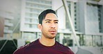 Breathe, fitness and man running in city for race, competition or marathon training. Sports, workout and young male athlete runner from Mexico on break for cardio exercise on bridge in urban town.