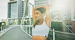 Woman, fitness and stretching in city for workout, exercise or outdoor training preparation. Active female person, athlete or runner in warm up arm stretch or getting ready for wellness at urban town