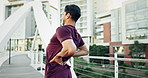 Man, back pain and injury in accident from workout strain or running exercise in city. Male person or athlete stretching in ache, sore or bruise of inflammation or outdoor training in fitness at town