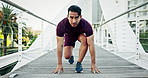 Start, runner or man in city for fitness training, race exercise or cardio workout on outdoor bridge. Health, tie laces or male sports athlete with energy, focus or footwear for running in urban town