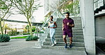 Couple of friends, running and training on stairs for workout, fitness and race with cardio health and teamwork in city. Young woman, man and personal trainer or runner for outdoor exercise in sports