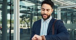Businessman, walking and watch outdoor in city for commute, travel or checking schedule and time. Entrepreneur, corporate or person and briefcase for work, appointment or meeting by building or smile
