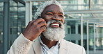 Senior black man, phone call and business communication in city for proposal or outdoor conversation. Face of mature African businessman smile and talking on mobile smartphone for discussion outside