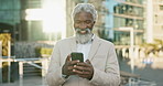 Outdoor, business and old man with cellphone, contact and typing with internet, city and smile. Opportunity, senior person and employee with smartphone, mobile user and lens flare with communication