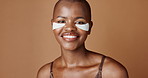 Skincare, health and face of black woman in studio with glowing, natural and facial routine. Smile, cosmetic and portrait of African person with dermatology beauty treatment by brown background.