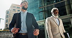 Business men, friends and walk in city, conversation and bag with greeting, respect and happy in urban road. People, corporate employees and smile for chat, talking and metro sidewalk in Cape Town