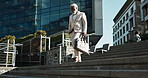 Business, stairs and outdoor with senior man, walking and employee with a briefcase, deadline and schedule. Mature person, African guy and entrepreneur on steps, New York and city with consultant