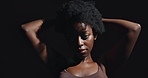 Hands, arms and beauty with black woman face on a dark background in studio for feminine wellness. Portrait, skincare and aesthetic with a confident model touching her body or skin in satisfaction