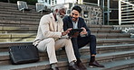 Tablet, conversation and business men in the city in discussion for corporate legal case. Teamwork, collaboration and male attorneys with digital technology sitting and talking on stairs in town.