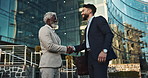 Business men, handshake and meeting in city for b2b partnership, outdoor deal and travel introduction or welcome. Corporate clients and senior boss shaking hands with time or schedule for consulting