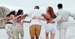 Beach, freedom and friends running to water with energy, excited or hug celebration in nature together. Travel, back and people at the ocean for fun, bonding and adventure, explore or Florida journey