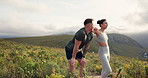 Mountains, tired and couple with fitness, hiking and relax with wellness, breathing and vacation. Romance, man and woman with fatigue, countryside and environment with exercise, healthy and workout