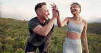 Mountains, tired and couple with fitness, high five and workout with wellness, breathing and achievement. Romance, man and woman with fatigue, countryside and environment with exercise and progress