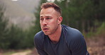 Tired man, runner and breathing in nature for training, workout and fitness goals, endurance and challenge. Young runner, athlete or sports person with fatigue, cardio exercise and break in forest