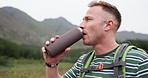 Hiking, fitness or tired man drinking water in forest for training, adventure or morning exercise in nature. Sports, fatigue or sweaty guy backpacker with hydration break in jungle for travel journey