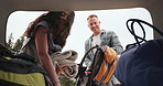 Couple, car trunk and backpack for road trip, travel or holiday with baggage, ready and talking. Man, woman and transport for journey with bag, luggage or outdoor in nature, woods or vehicle in Spain