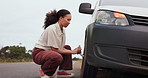 Woman, car breakdown and change tire with tools, thinking and problem solving for emergency on road. Girl, driver and iron for nuts, flat wheels and tyre fail with transport on street in countryside